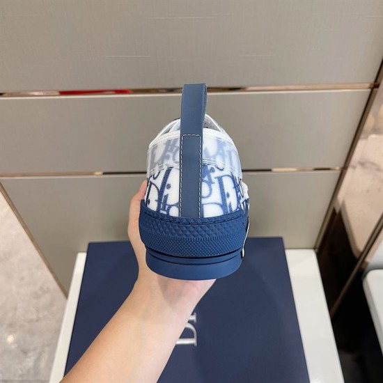 Rear heel perspective of Dior B23 low-top trainer highlighting pull tab and textured sole in blue