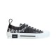 Dior B23 Low Top Black Monogram Canvas Trainer Studio Profile in black and white Isolated side profile of Dior B23 Low Top Black Monogram Canvas Trainer in black and white