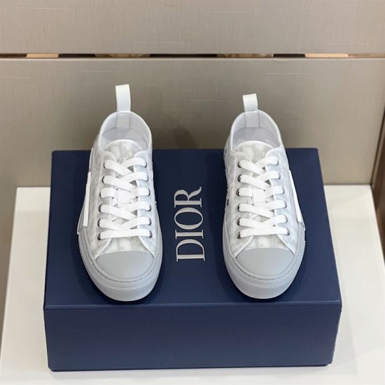 Dior B23 Low Top Grey Oblique Canvas Trainers Pair View Top front view of grey oblique canvas low-top trainers sitting on branded box