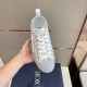 Dior B23 Low Top Grey Oblique Canvas Trainers Single Top View Top-down hand-held perspective of single grey oblique trainer