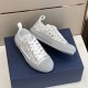 Dior B23 Low Top Grey Oblique Canvas Trainers Overhead View Overhead view of both grey low-top trainers displayed on dark blue box