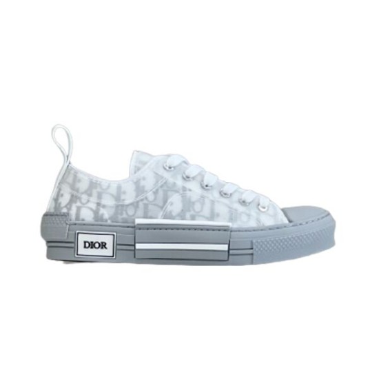 Dior B23 Low Top Grey Oblique Canvas Trainers Side Profile Side profile view of Dior B23 Low Top Grey Oblique Canvas Trainers featuring transparent overlays and grey sole