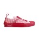 Isolated side view of Dior B23 Low Top Red Oblique Canvas Trainer