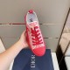 Handheld top view of single Dior B23 Low Top Red Oblique Canvas Trainer