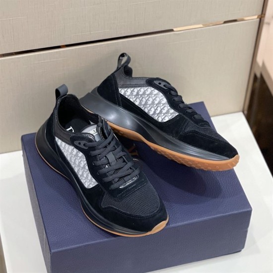 Dior B25 Runner Trainers Boxed Pair View in black Pair of Dior B25 Runner Trainers in black sitting on a designer shoebox