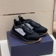 Dior B25 Runner Trainers Three-Quarter Angle in black Dior B25 Runner Trainers in black suede angled three-quarter view