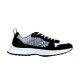 Dior B25 Runner Isolated Profile View in black and white Lateral side view of black and white Dior B25 Runner low top trainer on plain background