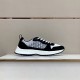 Dior B25 Runner Side View in black and white Side profile of black and white Dior B25 Runner low top trainer on display counter