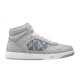 Dior B27 High-Top Grey Canvas Trainer - Lateral View in grey and white Lateral side profile view of Dior B27 high-top grey canvas trainer on plain backdrop in grey and white