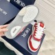 Underside view showcasing the grey and white pattern rubber tread on Dior B27 Trainers in red and white