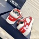 Rear angle view highlighting the red leather heel collar with Dior branding and rabbit graphic in red and white