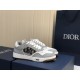 Dior B27 Low Top Grey White Canvas Low Top Trainers side view on blue packaging box