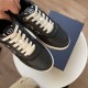Overhead view of a pair of black Dior B27 trainers with white laces