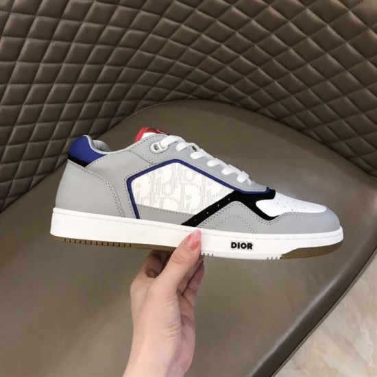 Dior B27 Low Top Grey White Canvas Trainer Midsole Detail Side view of Dior B27 Low Top Grey White Canvas Trainer showing rubber midsole logo