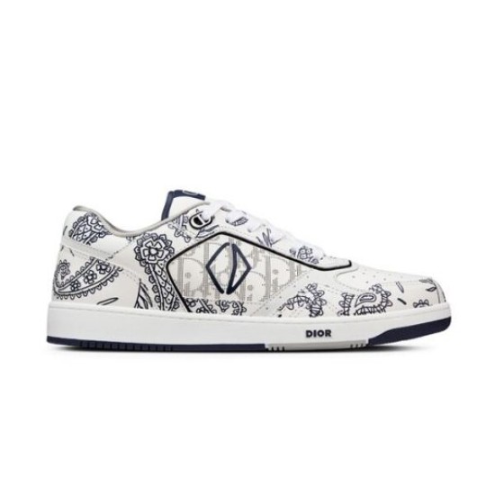 Studio side view of Dior B27 white and navy paisley low-top trainer