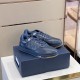 Dior B27 Low-Top Navy Blue Leather Trainers Front Angle Three-quarter view of Dior B27 Low-Top Navy Blue Leather Trainers on shoebox