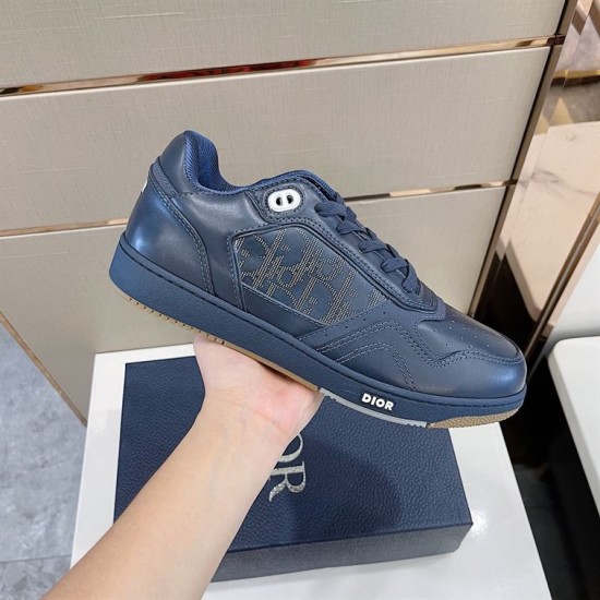 Dior B27 Low-Top Navy Blue Leather Trainer Handheld Profile Handheld lateral view of Dior B27 Low-Top Navy Blue Leather Trainer