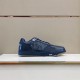 Dior B27 Low-Top Navy Blue Leather Trainers Lateral View Dior B27 Low-Top Navy Blue Leather Trainers side view on white pedestal