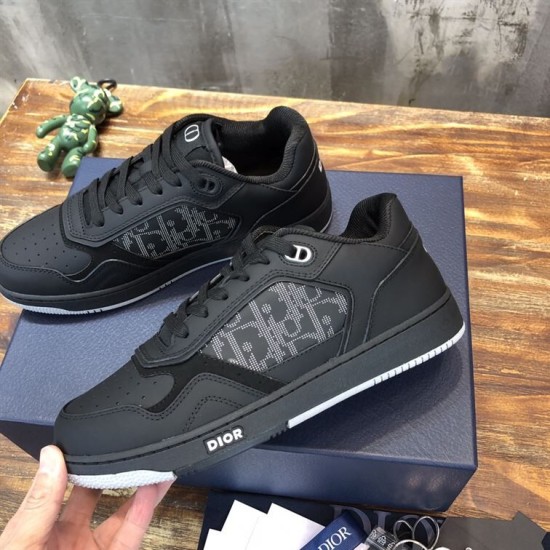 Side angled view of Dior B27 Low-Top Trainers In Black Leather