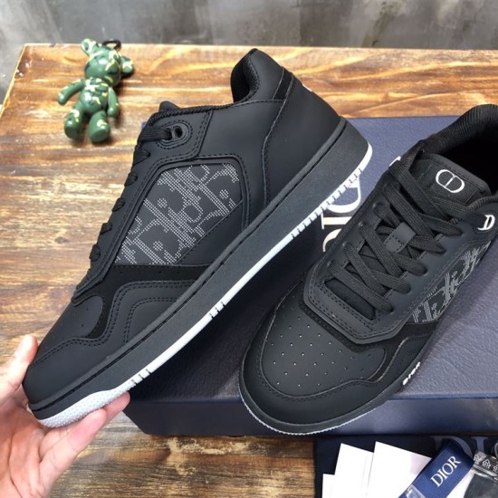 Close-up side perspective of Dior B27 Low-Top Trainers In Black Leather