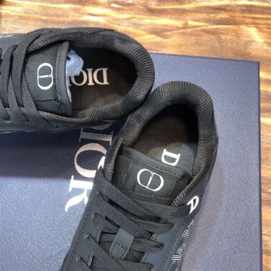 Interior lining and tongue detail of Dior B27 Low-Top Trainers In Black Leather