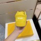 Rear view of yellow Dior B27 trainer showing white heel logo