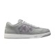 Side profile of the Dior B27 low top grey trainer isolated on white