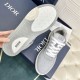 Bottom outsole tread pattern of the Dior B27 low top grey trainer in grey and white