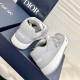 Rear view showing the grey leather heels embossed with Dior lettering in grey and white