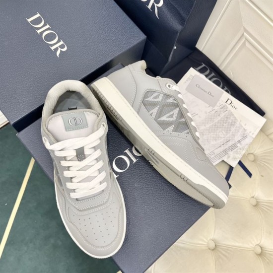 Dior B27 low top grey trainer showing side profile and lace-up details in grey and white