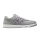 Dior B27 low top grey canvas and leather trainer profile view on a white background
