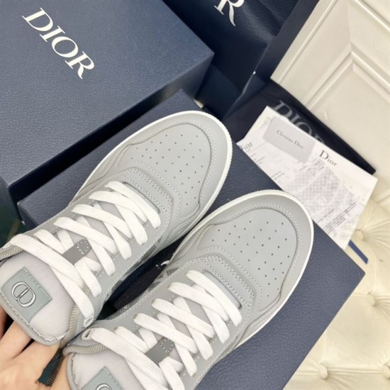 Close-up of the perforated toe cap on the Dior B27 low top grey trainer in grey and white