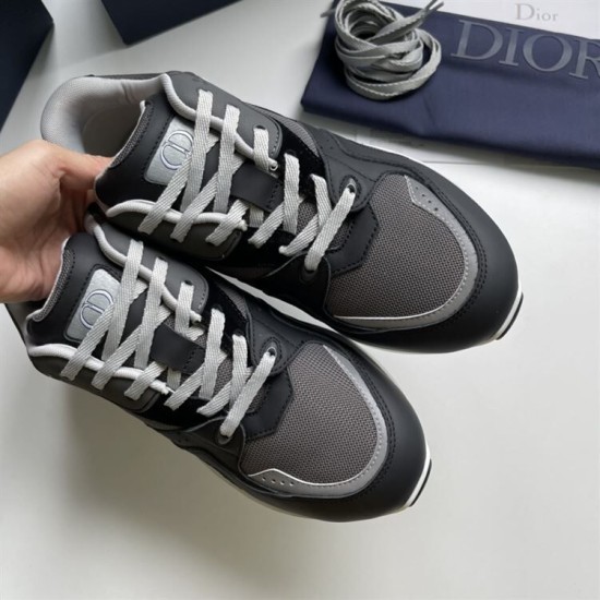 Top-down view of grey and black Dior B29 trainer toe boxes and laces
