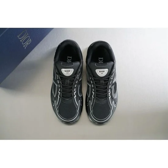 Top-down overhead pair view of Dior B30 black mesh technical trainers
