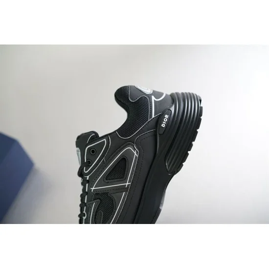 Close-up view of midfoot lateral side panel with Dior signature logo badge in black