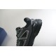 Close-up view of midfoot lateral side panel with Dior signature logo badge in black