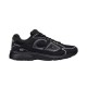 Full lateral side view of Dior B30 black mesh trainer on a plain white background