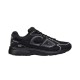 Side profile view of Dior B30 black mesh low top trainers with reflective trim