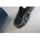 Detailed close-up of toe box mesh and reflective piping on black Dior B30 trainer