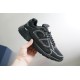 Hand holding Dior B30 black mesh trainer showing side profile and sole thickness