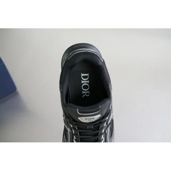 Direct overhead close-up view of the interior printed Dior insole and collar in black