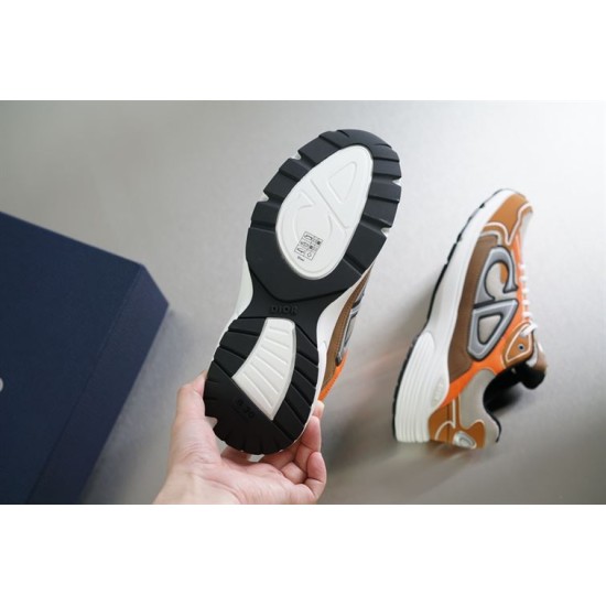Dior B30 Sole Tread View in beige and orange Underside view of black and white rubber tread pattern on Dior B30 trainer in beige and orange