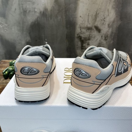 Rear heel view of Dior B30 trainers showing CD logos and light pink accents in grey and pink