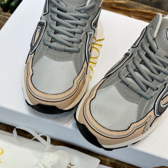 Close-up front angle of grey mesh and light pink toe area on Dior B30 trainers