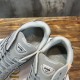 Close-up of Dior B30 tongue badges and interior collar padding in grey and pink