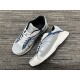 Dior B30 Light Blue Trainers Diagonal Pair Dior B30 light blue mesh trainer pair arranged diagonally