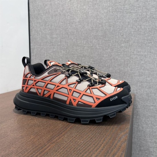 Dior B31 Runner Trainers Angled View in beige and orange Dior B31 Runner trainers in beige and orange shown from an elevated side angle