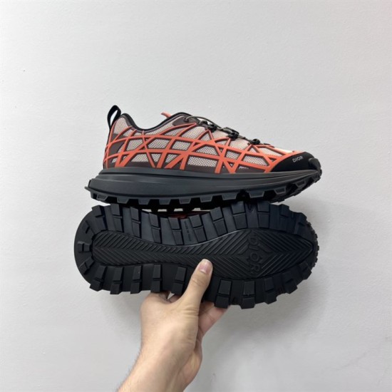 Dior B31 Runner Outsole Sole View in beige and orange Dior B31 Runner trainer showing the black tread outsole pattern and logo in beige and orange