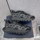 Dior B31 Runner Black Mesh Trainers Stacked View Side view of both Dior B31 Runner Black Mesh Trainers stacked horizontally.