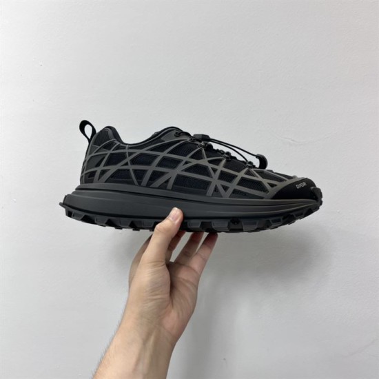 Dior B31 Runner Black Mesh Trainer Handheld View Dior B31 Runner Black Mesh Trainer held in hand displaying lateral side and sole profile.